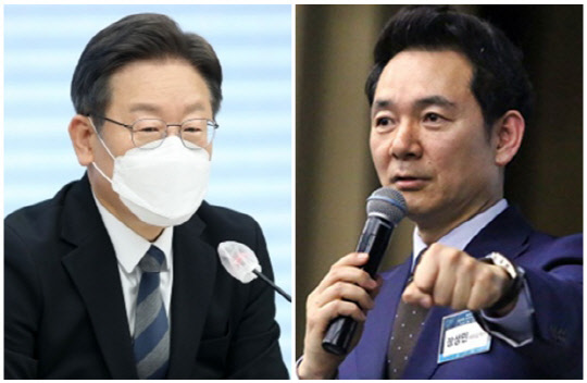 이재명(왼쪽) 더불어민주당 대선 후보와 장성민 전 국회의원. 연합뉴스